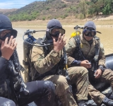 Marinos en operaciones de búsqueda y rescate en represa “La Angostura”